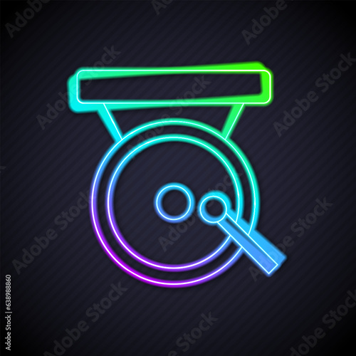 Glowing neon line Boxing gong icon isolated on black background. Boxing bell. Vector