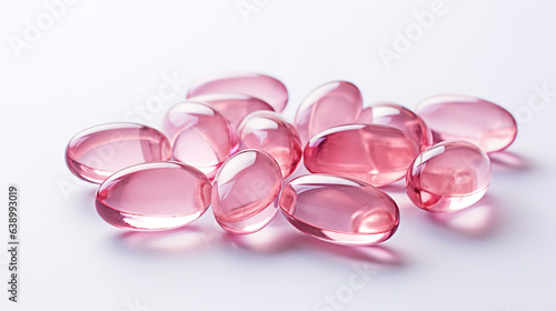 Pink transparent vitamins on a light background