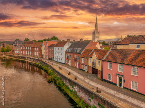 Norwich riverside and cathedral at sunset. City centre of Norwich in Norfolk, united kingdom photo