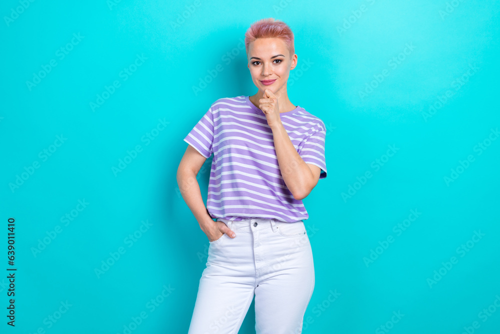 Photo of charming nice lady young age wearing trendy striped t shirt touch chin smart decide choice isolated on aquamarine color background Photo of charming nice lady young age wearing trendy striped t shirt touch chin smart decide choice isolated on aquamarine color background