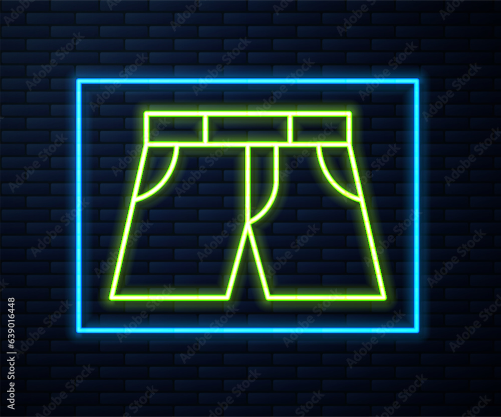 Glowing neon line Short or pants icon isolated on brick wall background. Vector