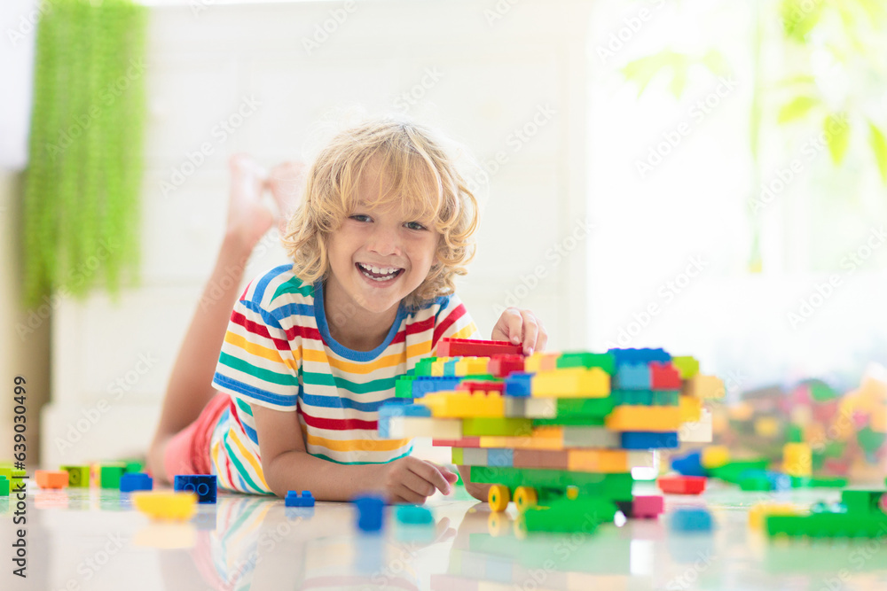 Child playing with toy blocks. Toys for kids. Child playing with toy blocks. Toys for kids.