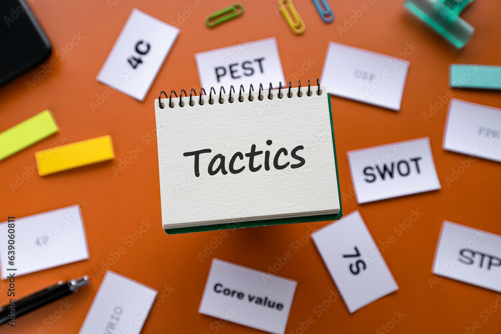 There is notebook with the word Tactics. It is as an eye-catching image. There is notebook with the word Tactics. It is as an eye-catching image.