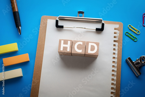 There is wood cube with the word HCD. It is an abbreviation for Human Centered Design as eye-catching image. photo