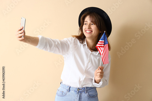 Young woman with USA flag t...