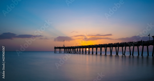 Sunset over the Gulf of Mexico at the Venice Fishing Pier in Venice Florida USA © Jim Schwabel