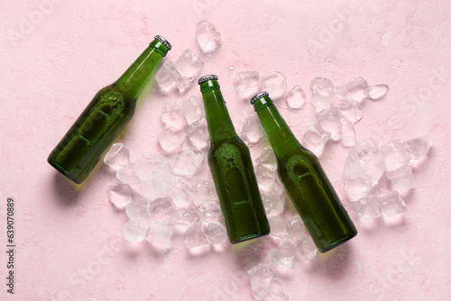 Three green beer bottles ch...