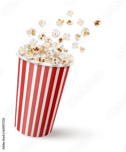 Popcorn cup for movies. Flying flakes in a paper bucket container cinema. Realistic movie theater snack food Cinema Snacks Packaging. Isolated on white background. Vector illustration.