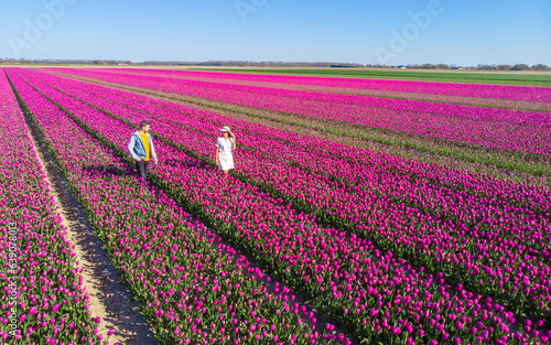 Photography Men and women in flower fields seen from above with a drone in the Netherlands,