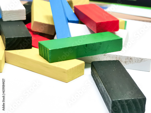 Colorful wooden blocks on white background.