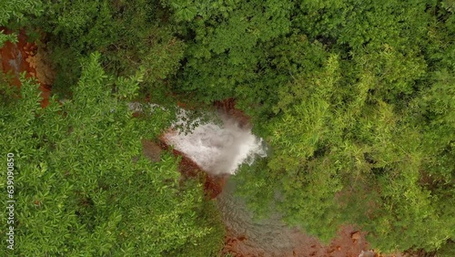 Birdseye view of the cascades at Pulangbato Falls in the Okoy valley, Valencia, Negros Oriental, Philippines. photo