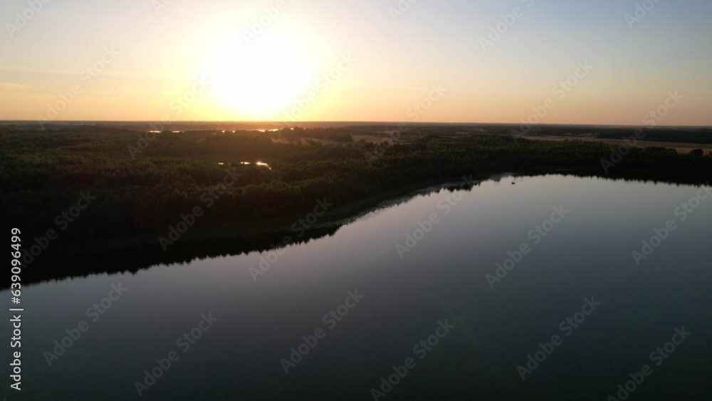 Peaceful Views Of Sunset Over Calm Popular Lake Peaceful Views Of Sunset Over Calm Popular Lake