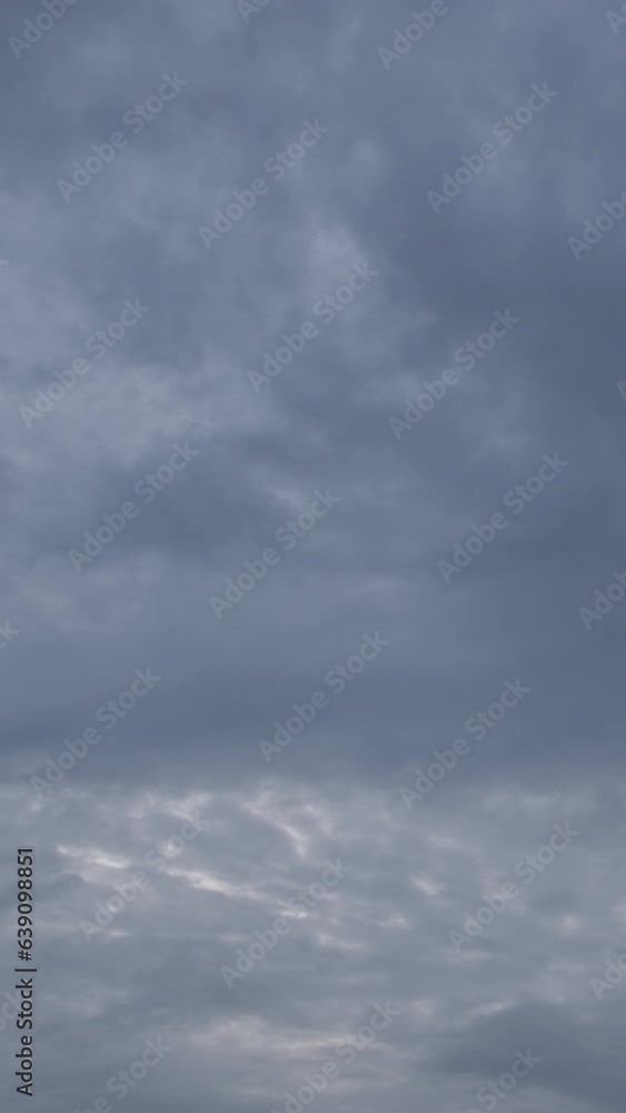 Storm cloud vertical video time lapse on a cloudy day. Storm cloud vertical video time lapse on a cloudy day.