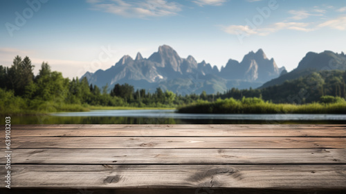 Old wood desk or wood floor for product display with mountain view and lake background © Ziyan Yang