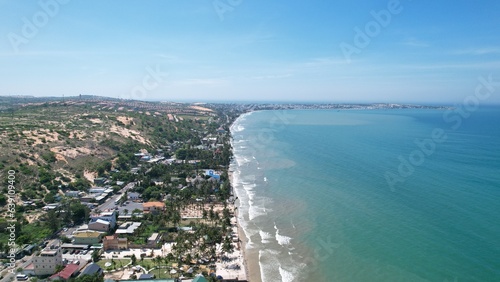 Aerial view of Swimming pool and the beach in the Phan Thiet resort, Binh Thuan Province, Viet Nam © Nhan