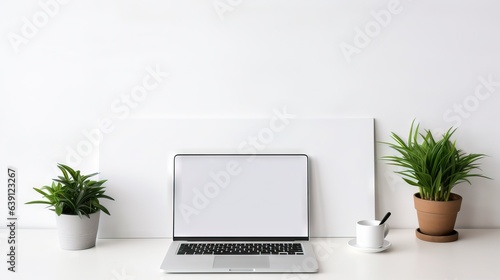  a laptop computer sitting on top of a white desk next to a potted plant. generative ai