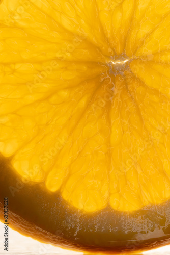 Micro close up of sliced orange and copy space