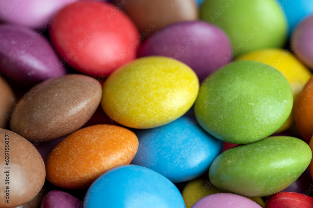Multicolored chocolates with chocolate filling Multicolored chocolates with chocolate filling