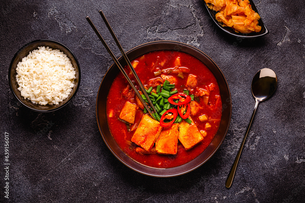 Korean traditional food, spicy kimchi soup (kimchi tige) with pork and