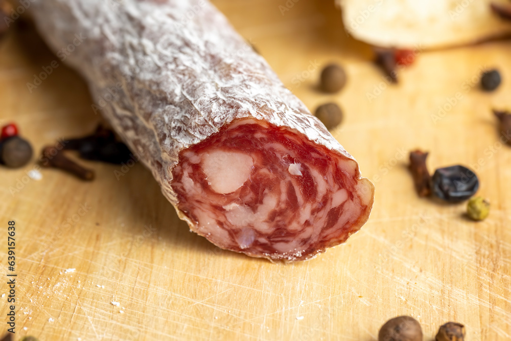 Sliced fresh pork sausage, close up Sliced fresh pork sausage, close up