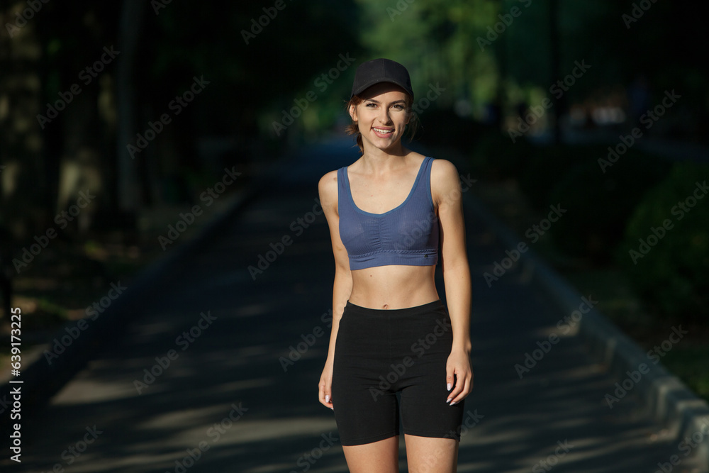 Athletic young woman in sportswear jogging in the park. Fitness and healthy lifestyle. Portrait of a beautiful young woman in sportswear outdoors. Sport fitness model caucasian ethnicity training outd Athletic young woman in sportswear jogging in the park. Fitness and healthy lifestyle. Portrait of a beautiful young woman in sportswear outdoors. Sport fitness model caucasian ethnicity training outd