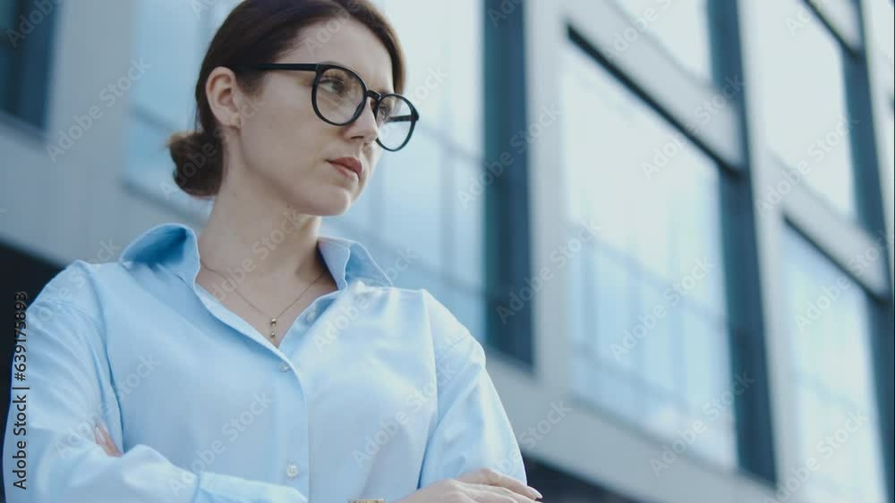Business lady looking seriously waiting for car to go on business, slow-motion Business lady looking seriously waiting for car to go on business, slow-motion