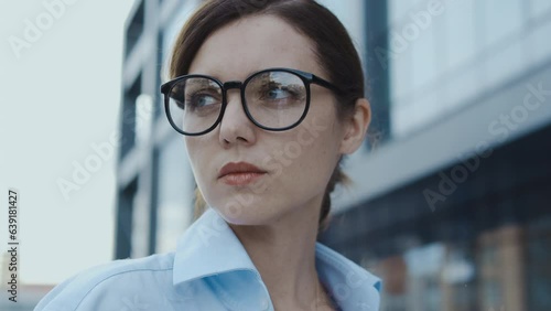 Nervous woman looking around, afraid of being followed, doesn't feeling safe