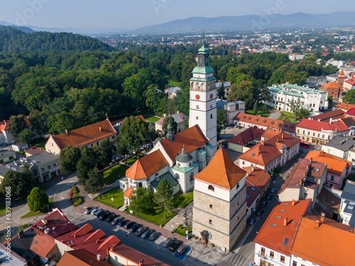 Fototapeta Naklejka Na Ścianę i Meble -  Aerial view of Zywiec. The old town of Zywiec, traditional architecture and the surrounding mountains of the Silesian Beskids and the Zywiec Beskids. Silesian Voivodeship. Poland. 