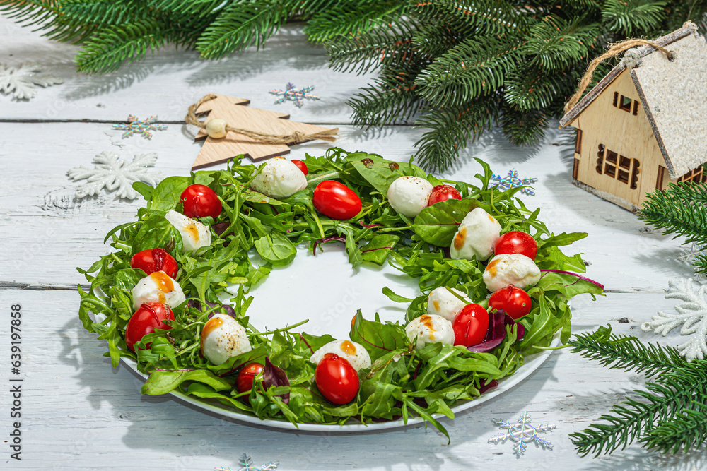 Charcuterie wreath with Christmas decorations. Fashionable snack, traditional New Year color design Charcuterie wreath with Christmas decorations. Fashionable snack, traditional New Year color design