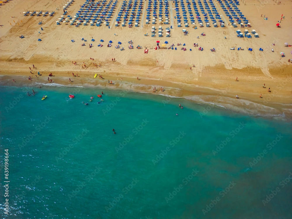 Summer Waves: A Bird's-Eye View of Rimini's Umbrella Studded Beach