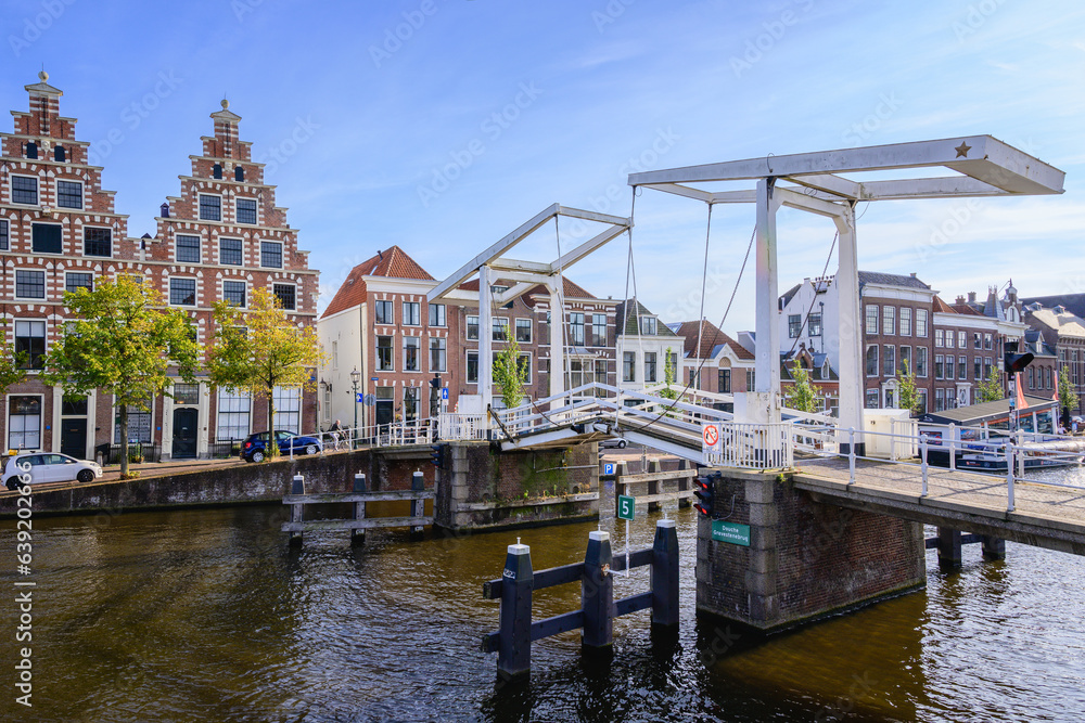 Gravestenenbrug - Bridge on Spaarne River and Old Canal Houses in Haarlem, Netherlands
