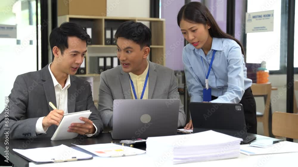 Asian business people working as a good team in the office. Successful teamwork in a meeting, workplace concept. Asian business people working as a good team in the office. Successful teamwork in a meeting, workplace concept.