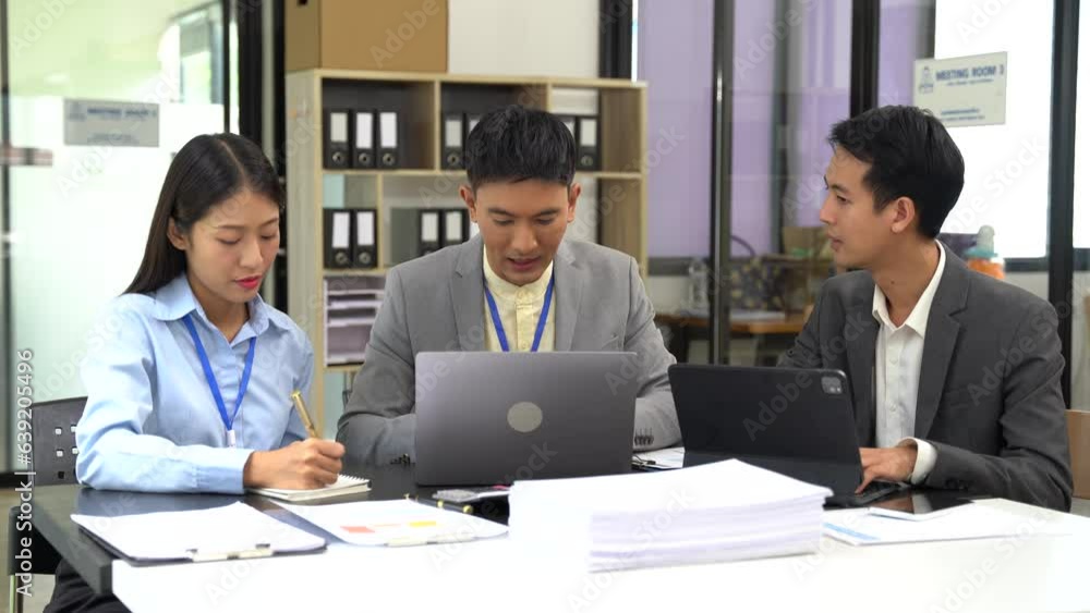 Asian business people working as a good team in the office. Successful teamwork in a meeting, workplace concept. Asian business people working as a good team in the office. Successful teamwork in a meeting, workplace concept.