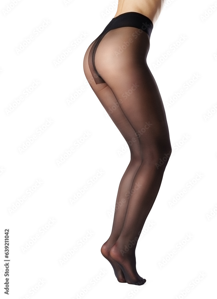 Legs of a woman in black capron tights on white background
