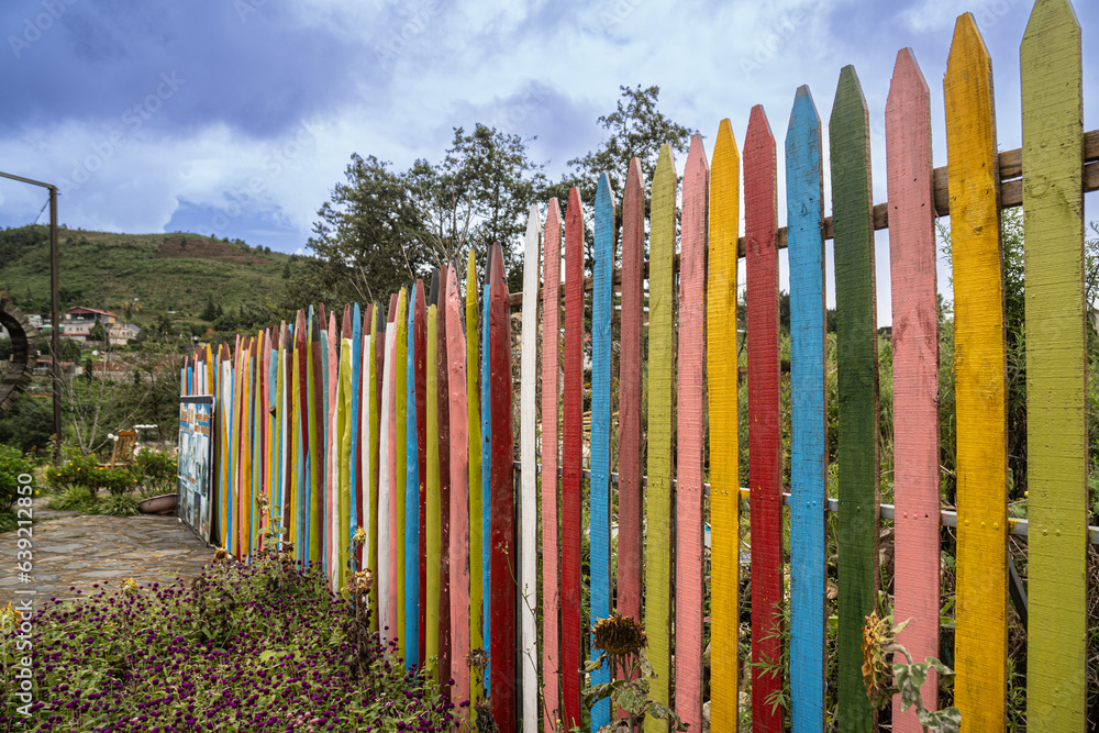 colorful wooden fence on beach colorful wooden fence on beach