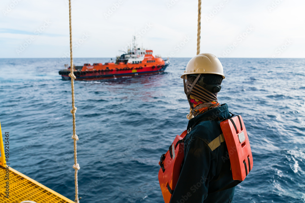 Fototapeta premium Offshore oil and gas wellhead remote platform which produced raw material for sent to onshore refinery, power generation and petrochemical industry.