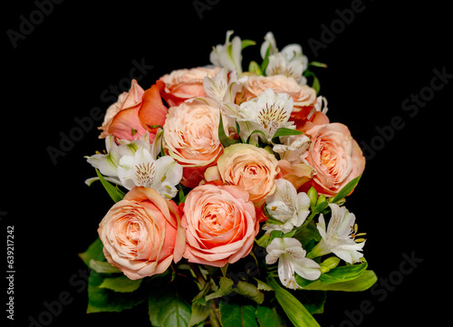 Bouquet of roses on a black background.