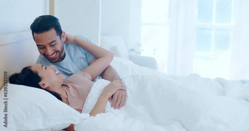Bed, relax and couple with love, kiss and romance with marriage, morning and home with bonding. People, man and woman with a smile, care and relationship with trust, bedroom and dating with passion Bed, relax and couple with love, kiss and romance with marriage, morning and home with bonding. People, man and woman with a smile, care and relationship with trust, bedroom and dating with passion