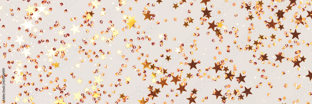 Banner with glowing golden stars and crystals confetti on a gray background. Festive backdrop. Banner with glowing golden stars and crystals confetti on a gray background. Festive backdrop.