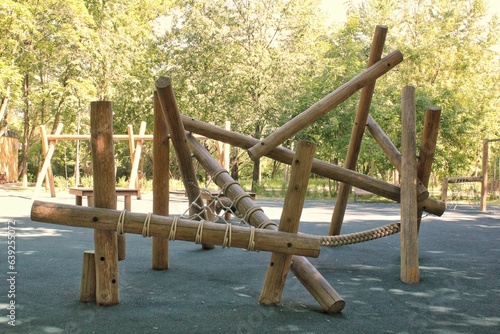 Canvas Print Wooden playground made of natural eco-friendly material in public city park