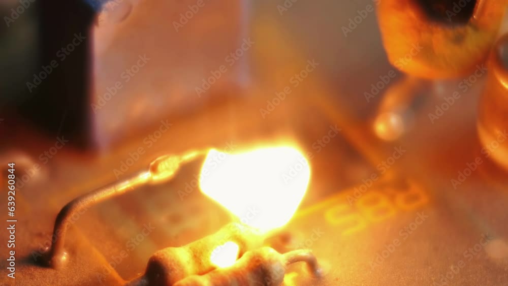 Video Stock Tantalum capacitor explodes in slow motion. Computer virus