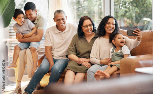 Happy family  selfie and grandparents and children on sofa for holiday  love and relax together at home. Interracial people  mother and father with kids in living room  profile picture or photography