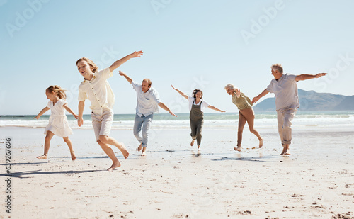 Running, freedom and family on beach, airplane and game with travel and fun, grandparents with parents and kids outdoor. Playful, energy and playing together, ocean and care free on tropical vacation