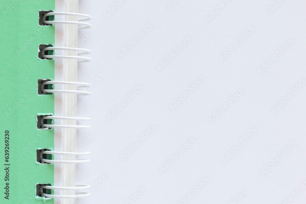 Notebook isolated on green background with copy space for text or image. Notebook isolated on green background with copy space for text or image.