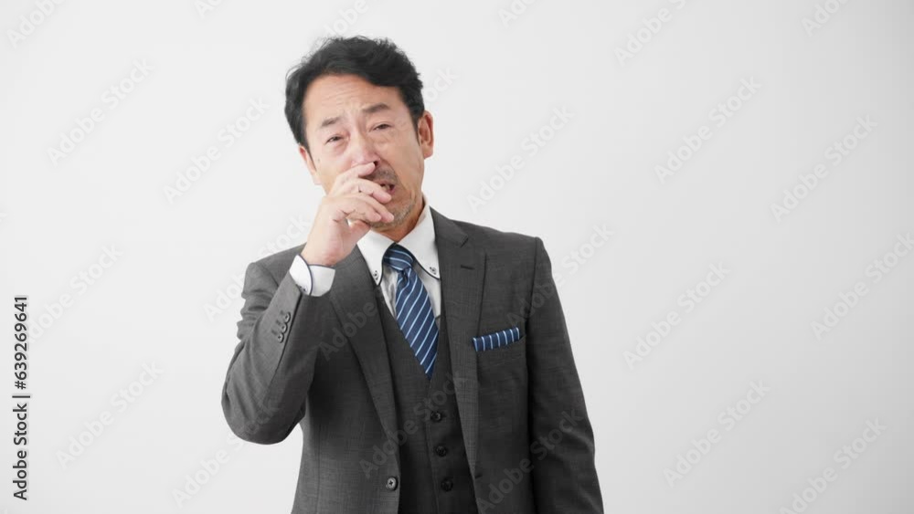 悲しんでいるミドル男性 ビジネスイメージ
悲しんでいるミドル男性 ビジネスイメージ