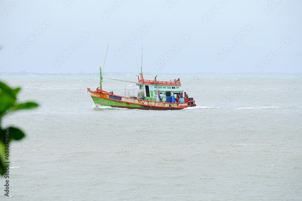 fishing boat in the sea , fishing boats to find fish.