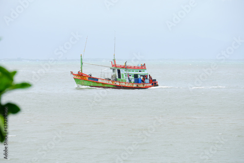 fishing boat in the sea , fishing boats to find fish.