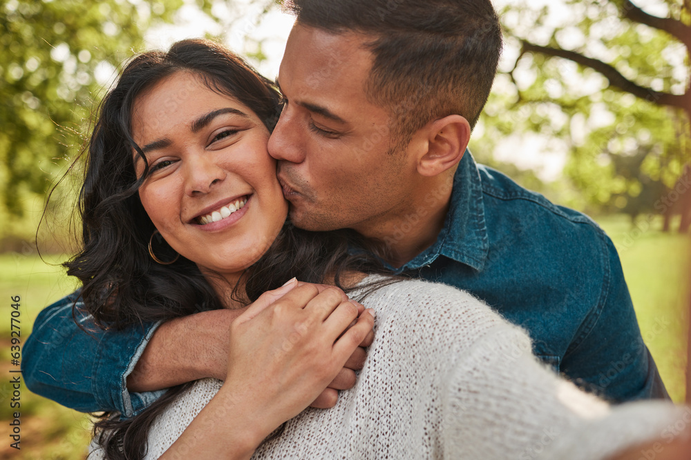 Nature portrait, selfie or couple kiss for romantic outdoor date, bonding and photography on love journey in forest woods. Park, face or relax man, woman or marriage people affection for memory photo Nature portrait, selfie or couple kiss for romantic outdoor date, bonding and photography on love journey in forest woods. Park, face or relax man, woman or marriage people affection for memory photo
