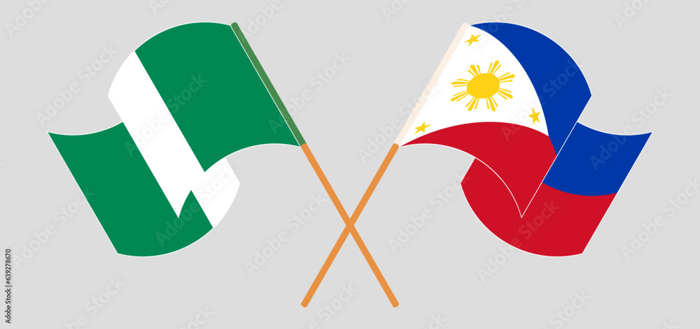 Crossed and waving flags of Nigeria and the Philippines Crossed and waving flags of Nigeria and the Philippines