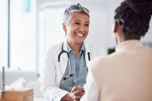 Happy, mature or doctor consulting a patient in meeting in hospital for healthcare help, feedback or support. People, medical or nurse with black woman talking or speaking of test results or advice
